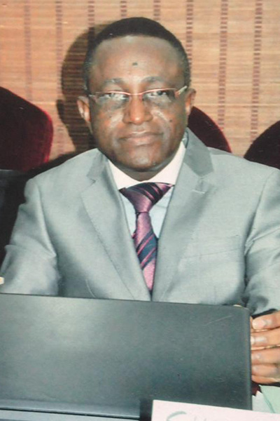 John SHEKOMBO